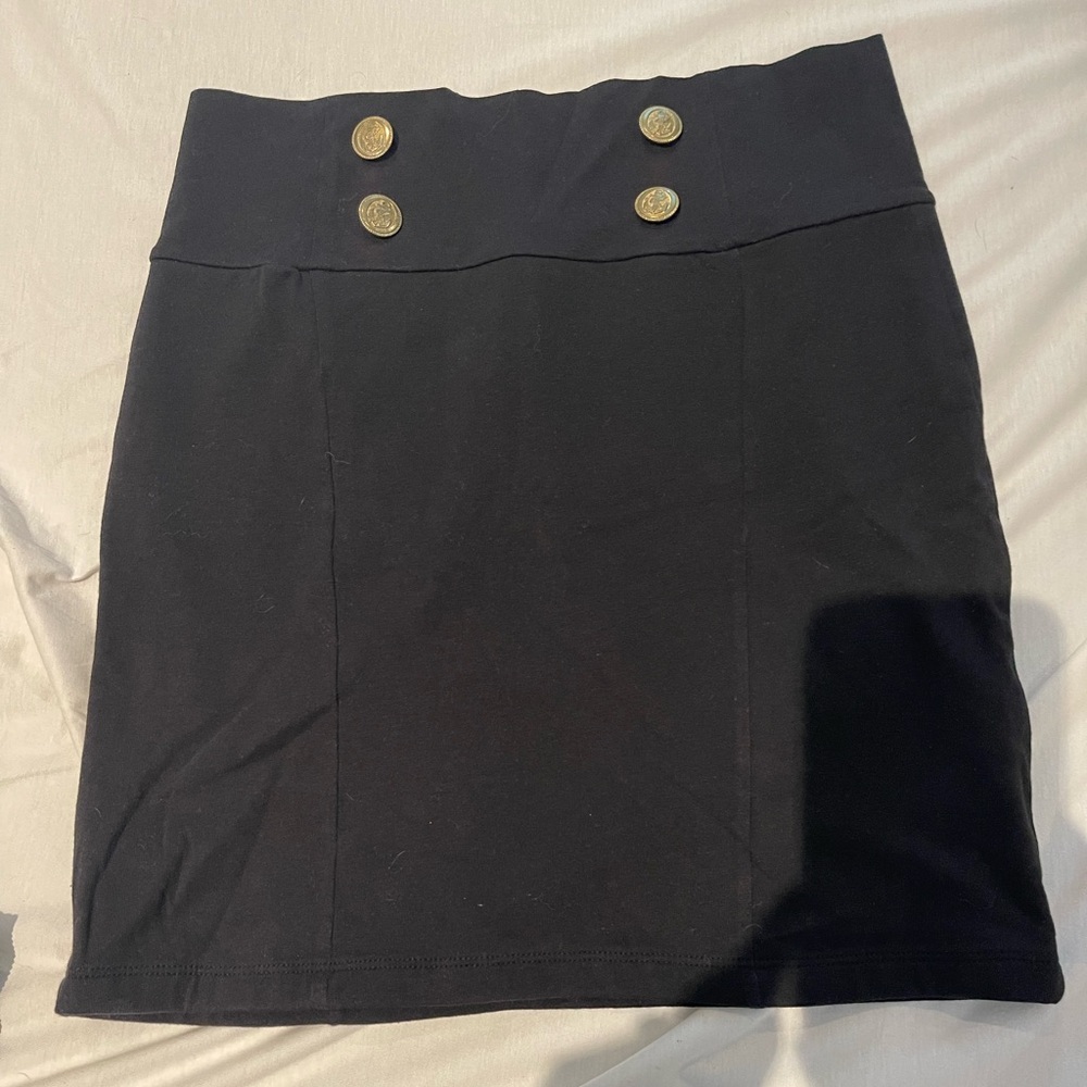 Black stretchy mini skirt with button details